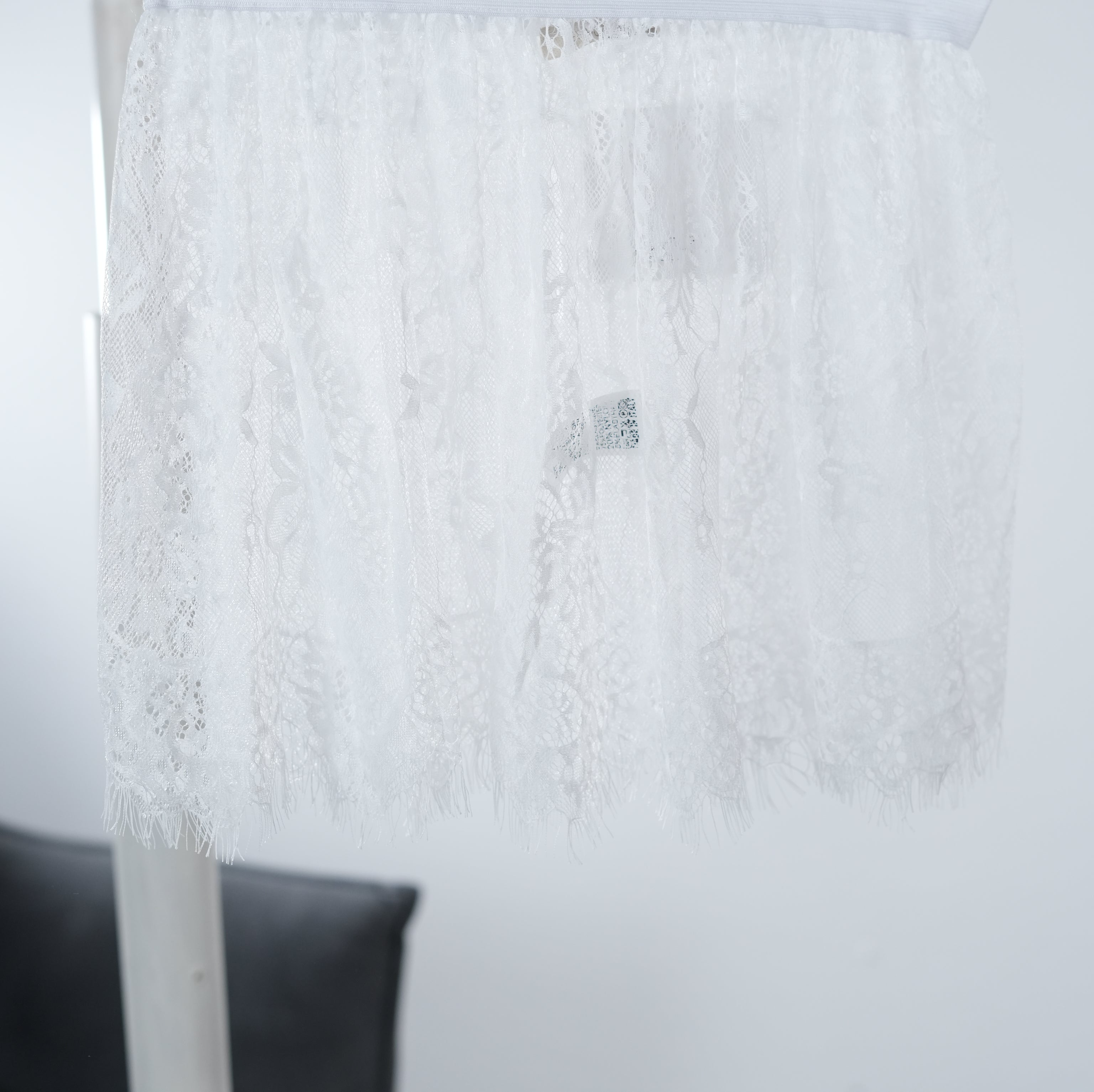 Blusenverlängerung aus Spitze Weiß