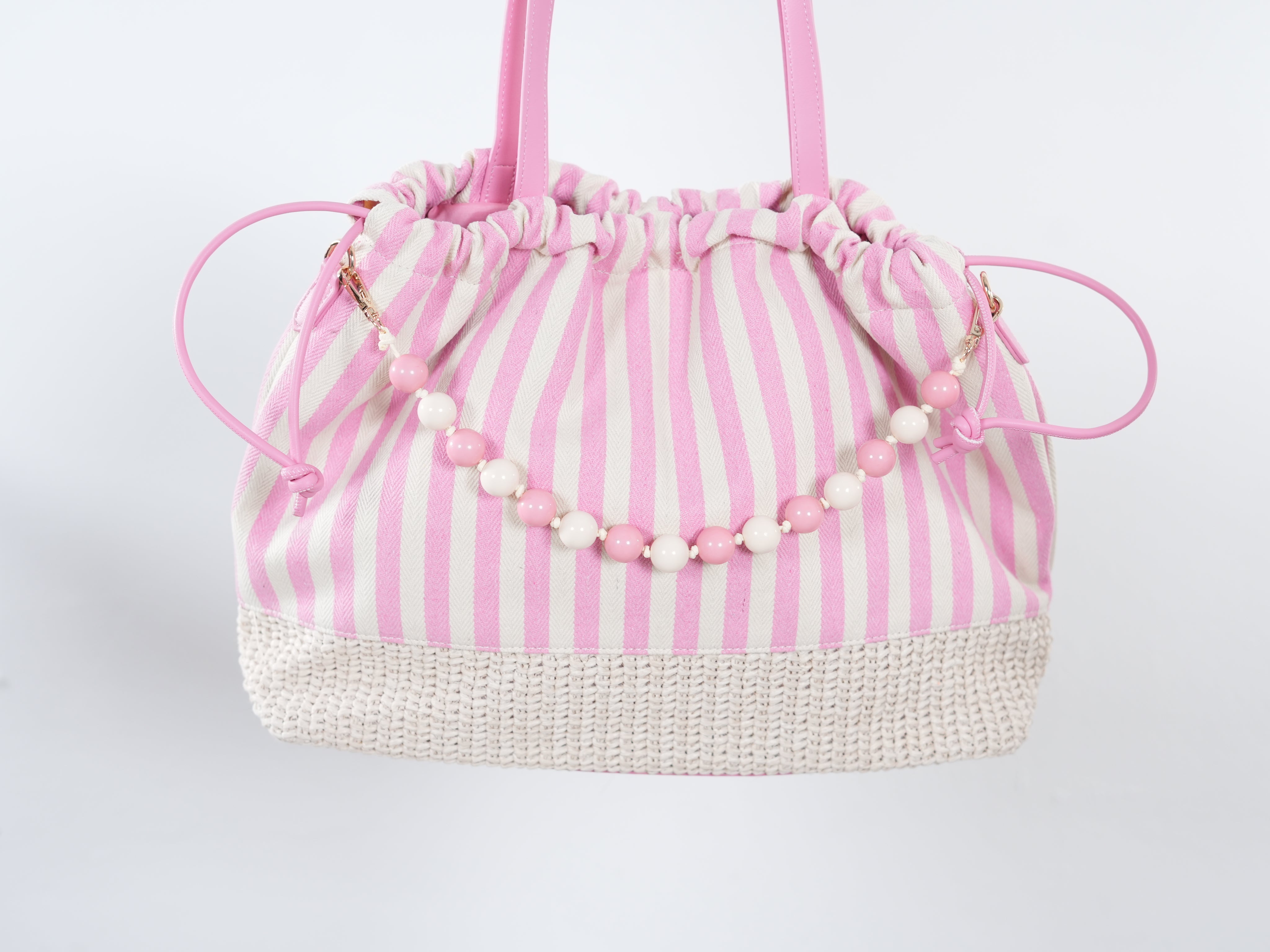 Gestreifte Tasche mit Perlenkette Babypink