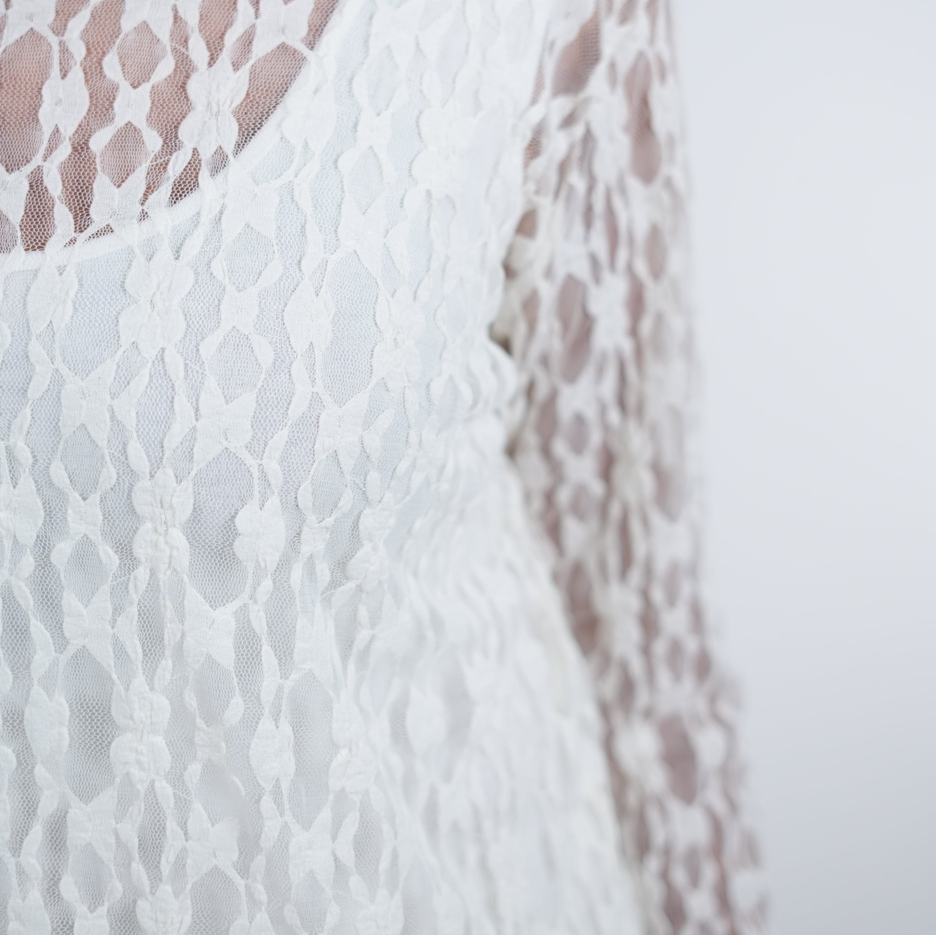 Asymmetrisch geschnittenes Unterzieh Top aus Spitze