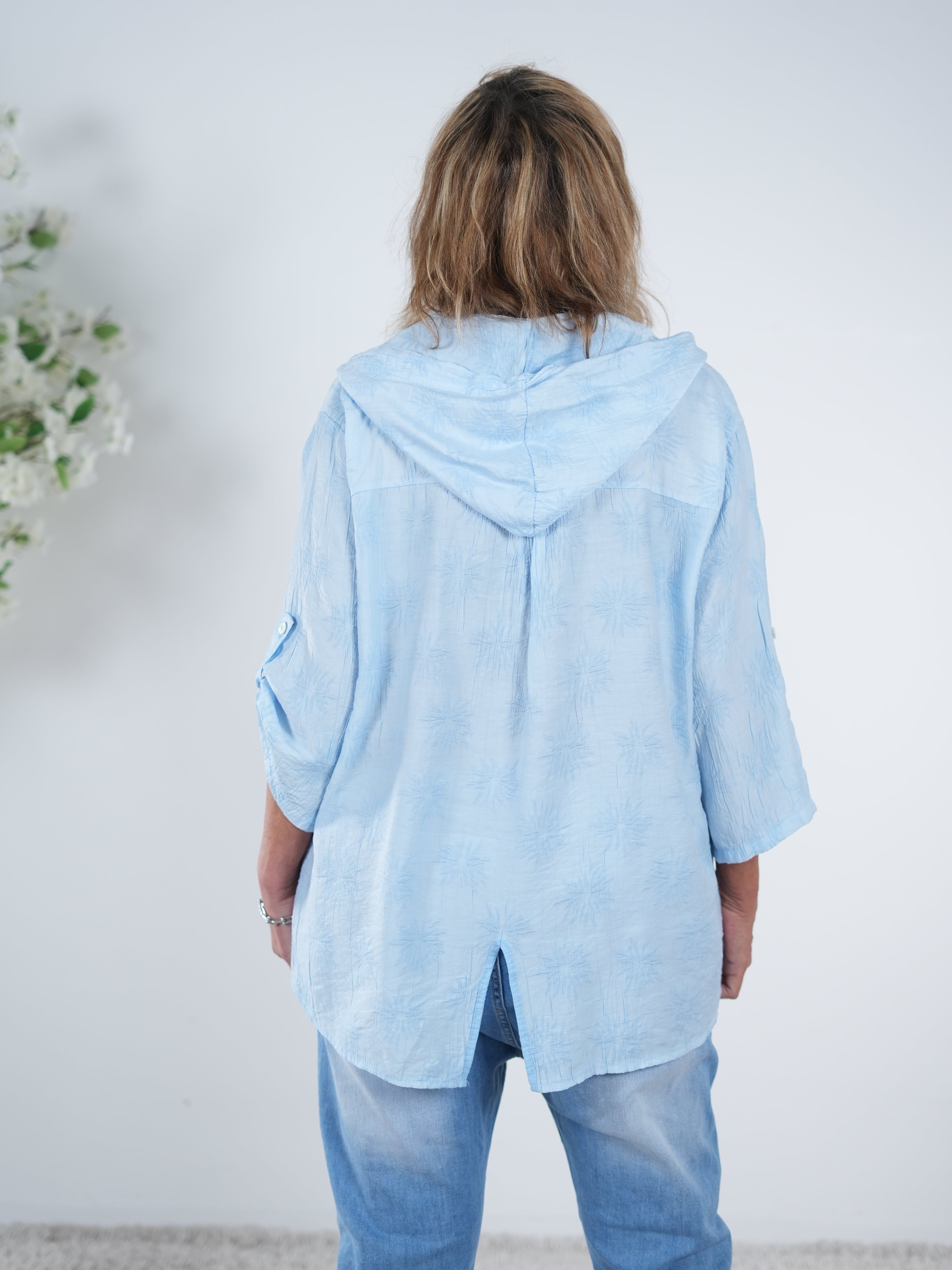 Bluse mit V-Ausschnitt und Kapuze