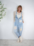 Jeans Latzhose mit Blümchen Patch