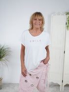 lässiges Shirt mit Smile Schriftzug in Strasssteinen