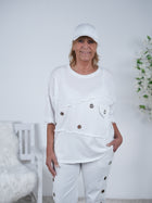 oversize Shirt mit ausgefransten Ärmeln und Ösen