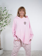 oversize Shirt mit Kapuze und Skull Patch