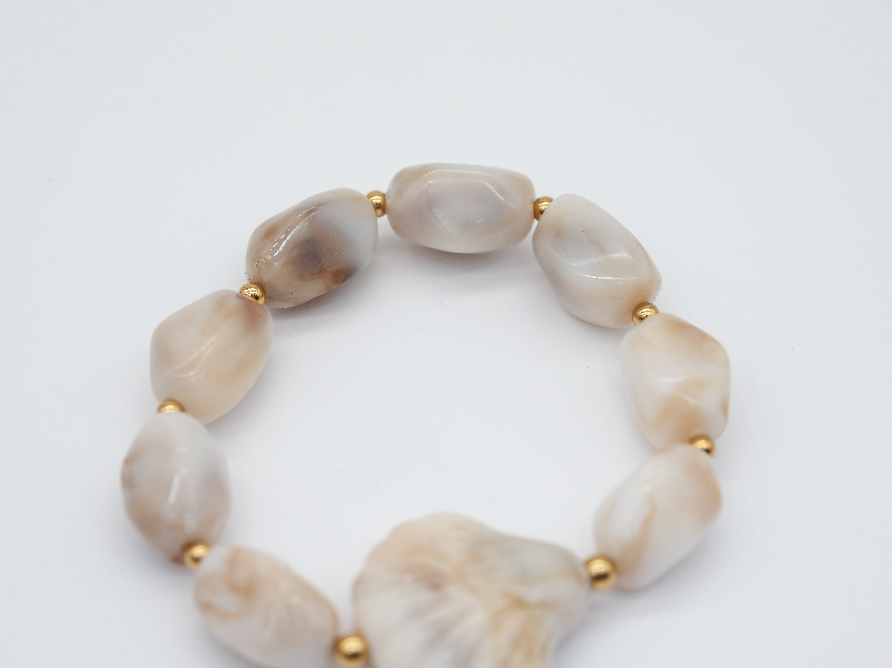 Armband mit Muschel verziert