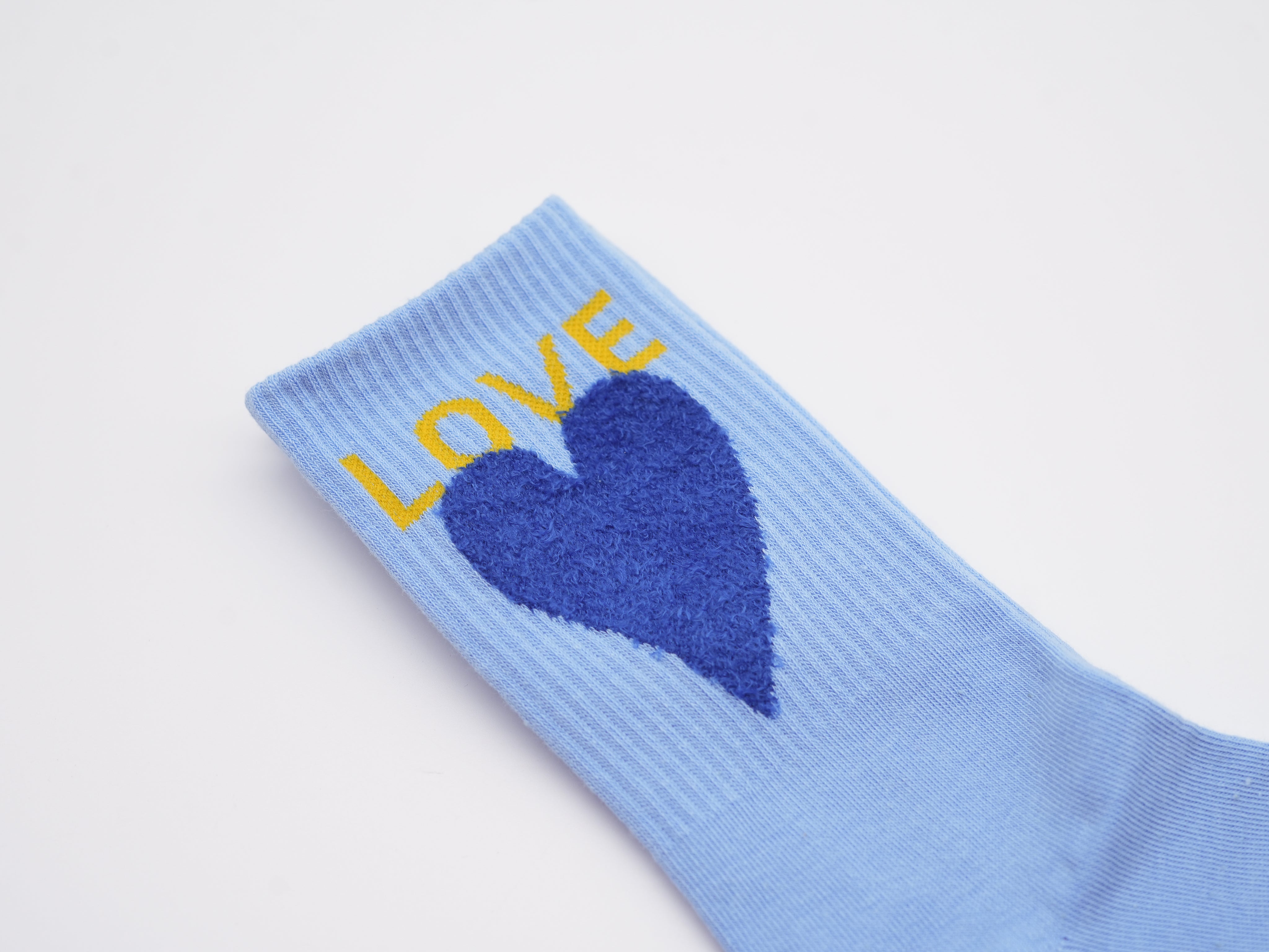 Socken mit farbigem Herz