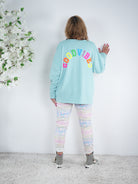 Sweaty mit V-Ausschnitt und "good vibes" Bestickung