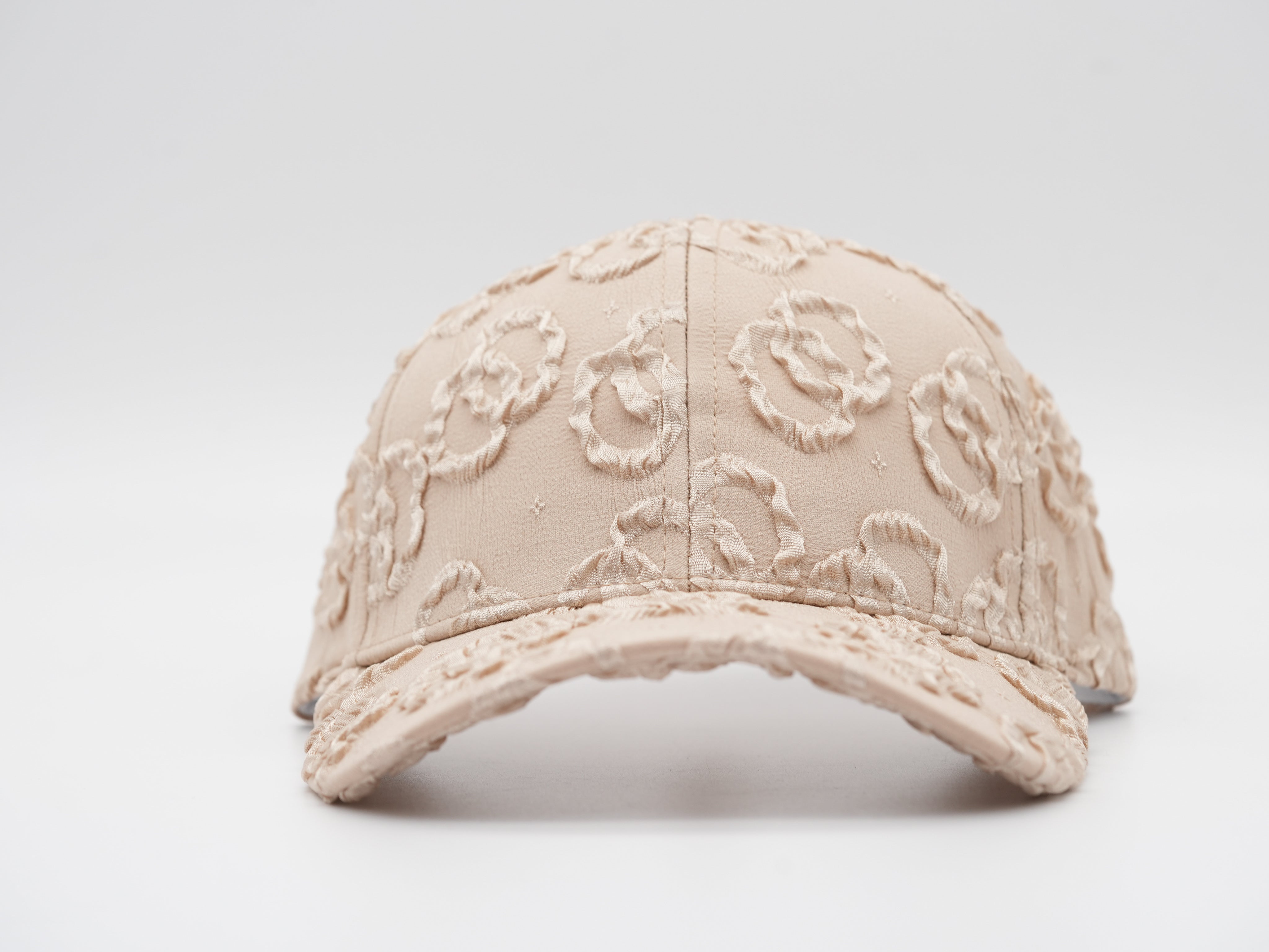 Cap mit geshopptem Textil Sand