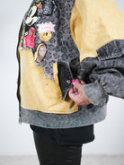 Ausgefallene Jacke im College Stil mit Comic Motiv