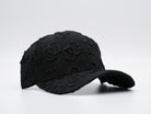 Cap mit geshopptem Textil Schwarz