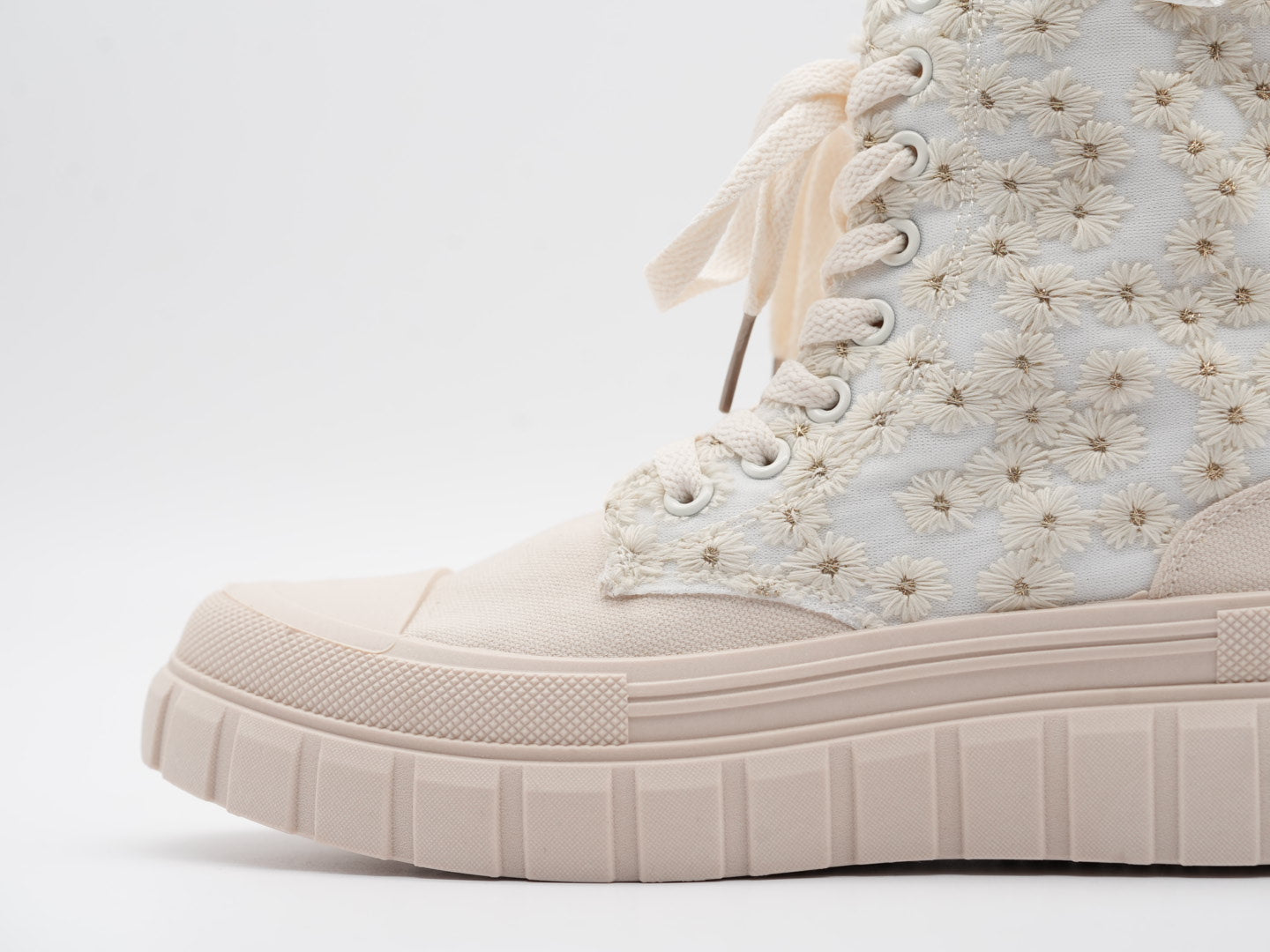 Beige Boots mit Blümchen verziert