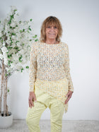 Asymmetrisch geschnittenes Shirt mit Blümchen verziert