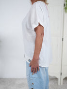 gerade geschnittenes Leinen Shirt mit Ösen am Abschluss