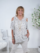 Leinen Shirt mit Cut Outs im Leo Look