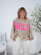Leo Poncho mit Smile Print Einheitsgröße (ca Gr. 38 40 "oversize"-48) Gelb