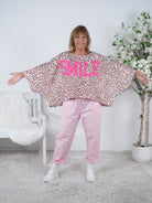 Leo Poncho mit Smile Print