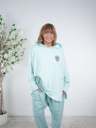 oversize Shirt mit Kapuze und Skull Patch