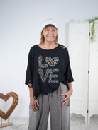 Poncho Shirt mit aufwendigem Motiv Schwarz