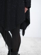 Nahaufnahme mit Fokus auf den Abschluss aus Tüll. 