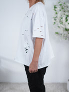 Shirt mit Rundhalsausschnitt und Ketten verziert