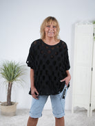 Sportliches Shirt mit Cut Outs und Netz Schwarz