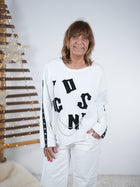 Ausgefallenes Sweaty mit Nieten und Kette verziert