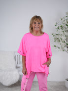 unifarbenes Shirt mit überschnittenem Arm und D-Ring Neon Pink